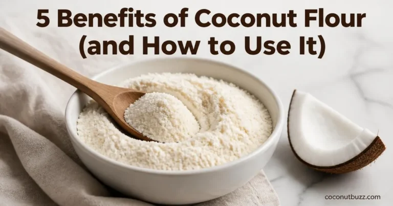 white ceramic bowl of fine coconut flour with coconut shell piece and wooden spoon on light marble surface with linen napkin