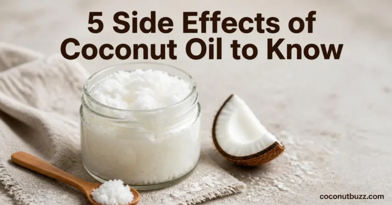 clear glass jar of solid white coconut oil with wooden spoon and fresh coconut shell piece on neutral background