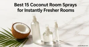 Coconut room spray trio - three unlabeled spray bottles with halved coconut and palm leaf on light marble surface